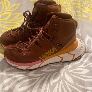 Hoka Brown and Pink Athletic Shoes with Modern Midsole